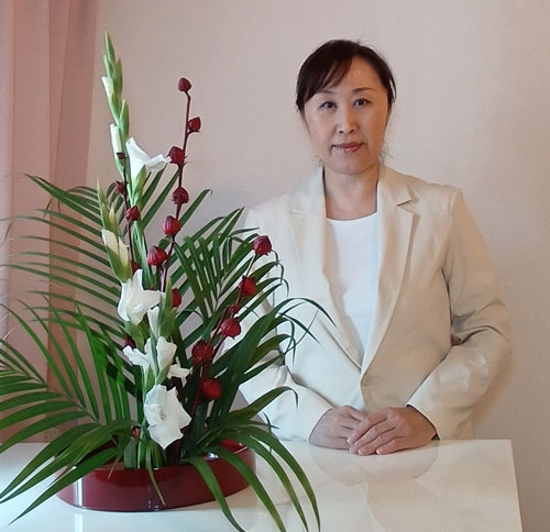 代表　佐藤　久美子
